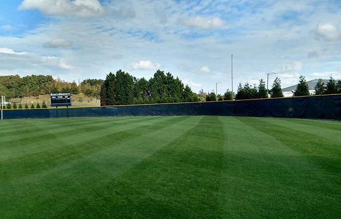 After mowing baseball outfield at Averett University.